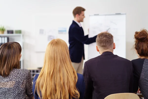 Young business manager giving a presentation — Stock fotografie