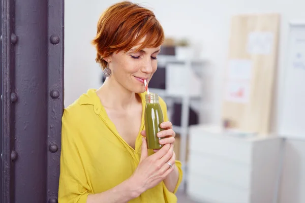 Woman Sipping Health Shake in Home Office — 图库照片