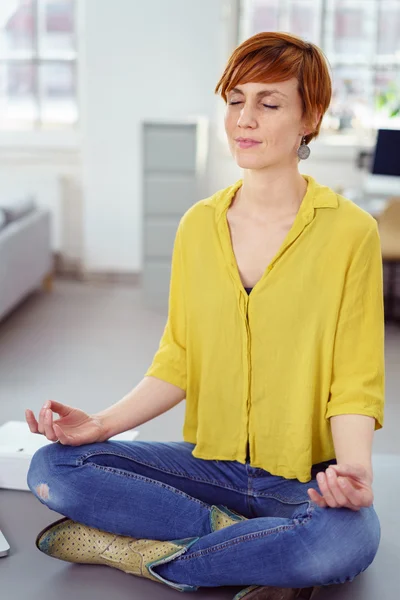 Woman with Red Hair Meditating in Home Office — Stockfoto