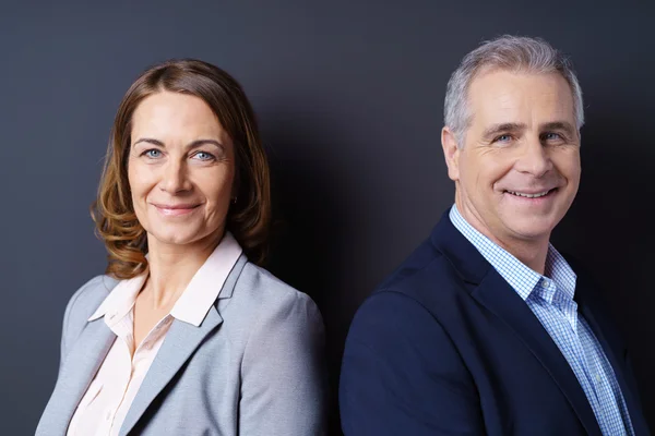 Close up of male and female business partners — Stock Photo, Image