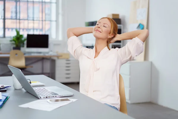 Happy relaxed successful businesswoman — Stock Photo, Image