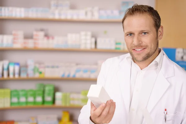 Handsome helpful pharmacist — Stock Photo, Image