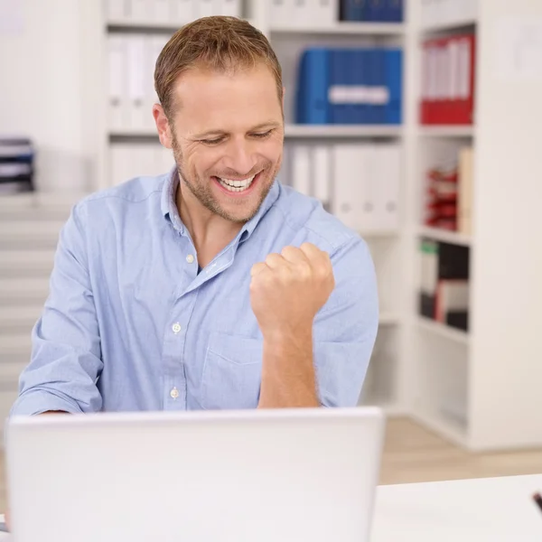 Jubilant businessman cheering — Stock Photo, Image