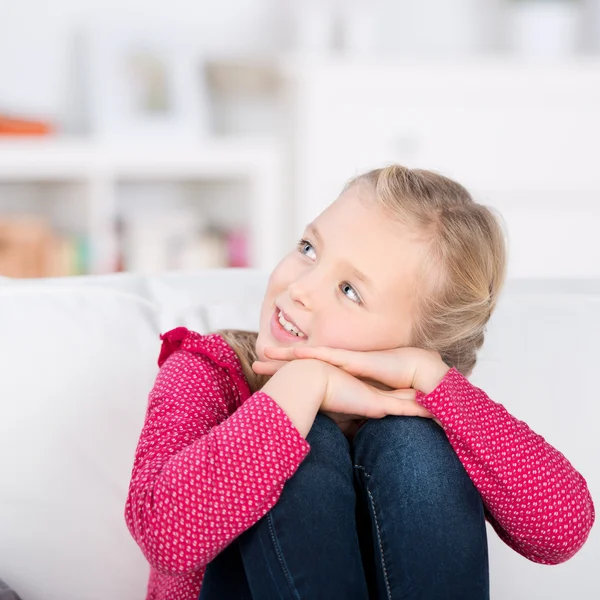 Little girl at home looking up — Stock Photo, Image