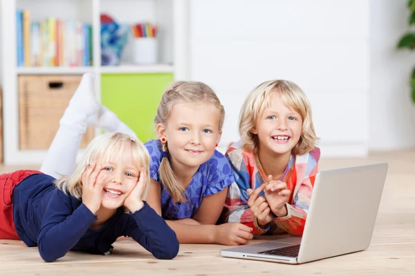 Little girls using notebook — Stock Photo, Image