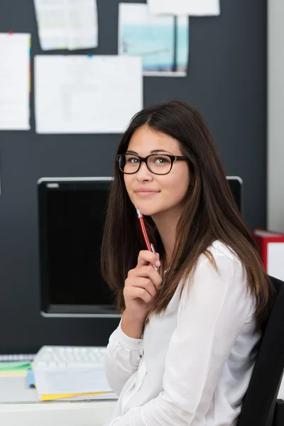 Pensive friendly young businesswoman — Stock Photo, Image