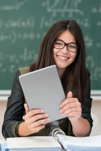 Happy young girl in class at college — Stock Photo, Image