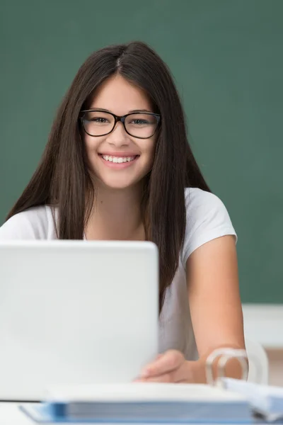 Smiling happy young girl in college — Stock Photo, Image