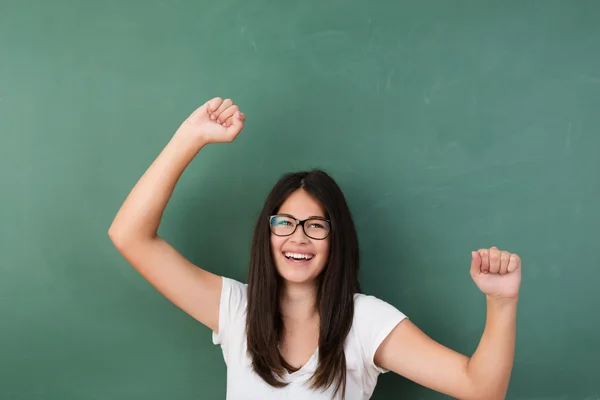 Happy triumphant young girl rejoicing at school — Stock Photo, Image
