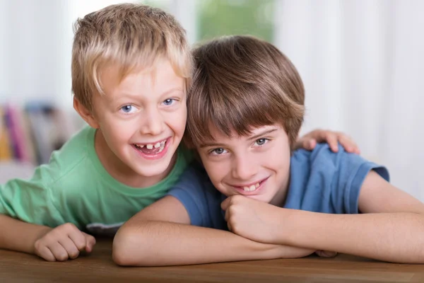 Two happy affectionate young brothers — Stock Photo, Image