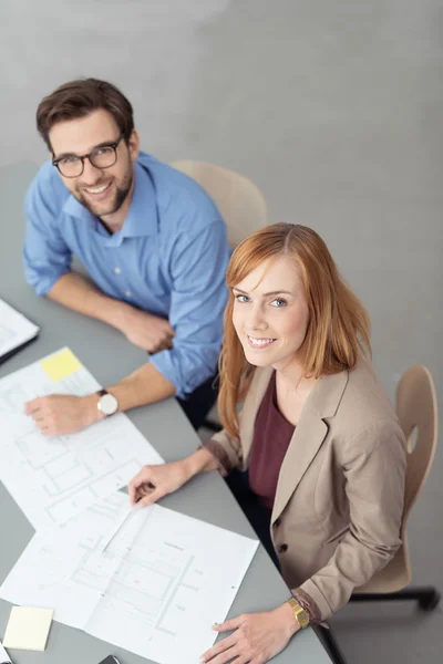 Business People Smiling at Camera in Meeting — Stock Photo, Image
