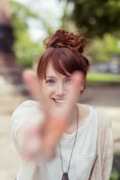 Pretty Young Woman Showing Peace Hand Sign — Stock Photo, Image