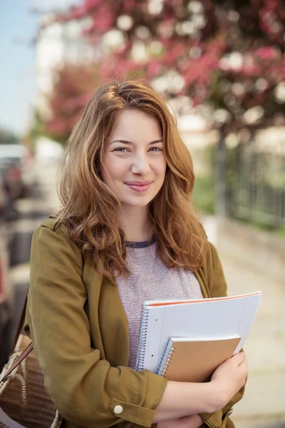 School Girl Holding her Notes Looking at Camera — Stok fotoğraf