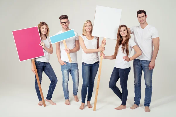 Young Friends Holding Empty Colored Placard — Stockfoto