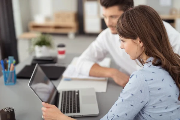 Serious Office Woman Watching Something on Laptop — Stok fotoğraf