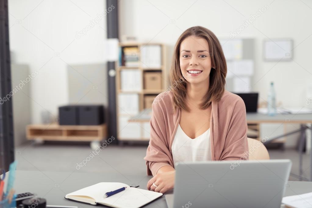 https://st2.depositphotos.com/2309453/7953/i/950/depositphotos_79532316-stock-photo-office-woman-sitting-at-her.jpg