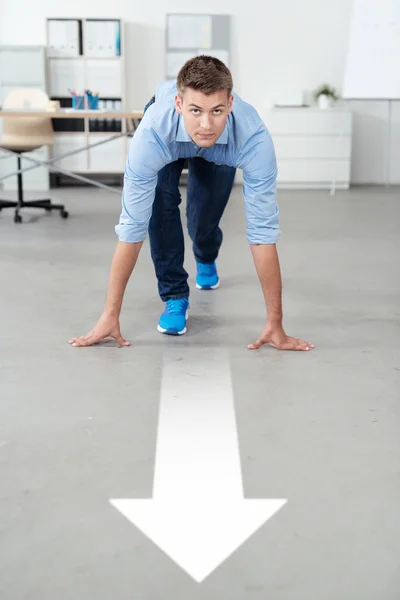 Handsome Office Guy in Running Start Position — Stock Photo, Image