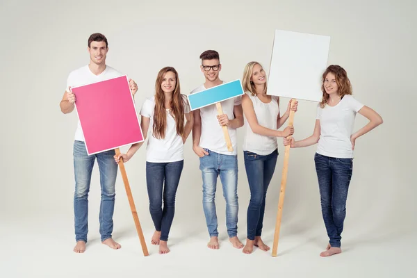 Young Friends Holding Empty Colored Placards — Stockfoto