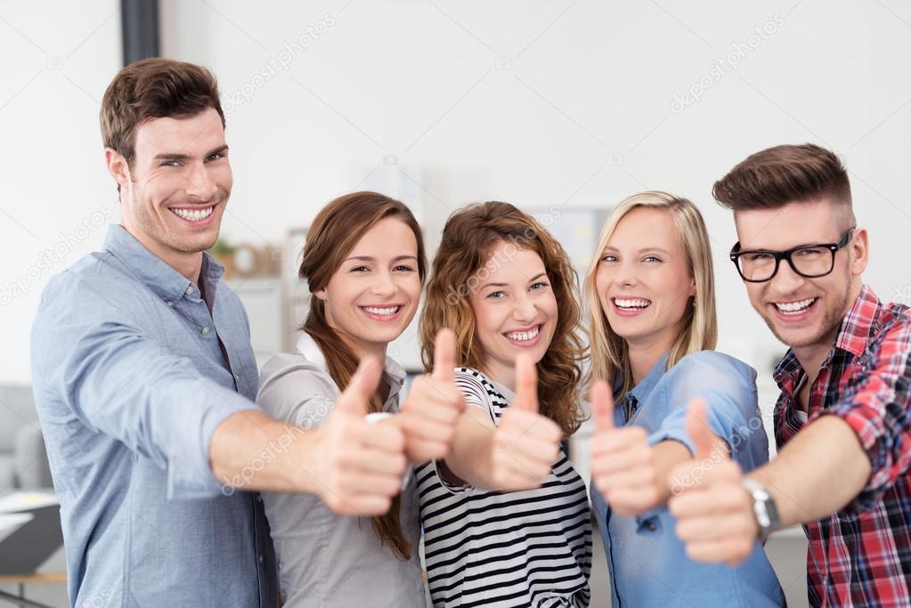 Five Happy Office Workers Showing Thumbs Up Stock Photo by ©racorn 83313132
