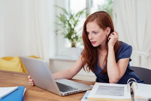 Pretty young student studying at home — Stock Photo, Image