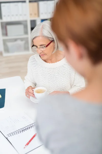 Senior Businesswoman Reviewing Documents on Table — Stock Photo, Image