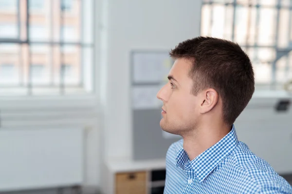 Pensive Young Businessman Looking Into Distance — Stock Photo, Image