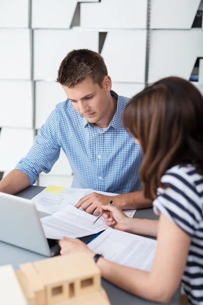 Businesspeople Reviewing Document in the Office — Stok fotoğraf