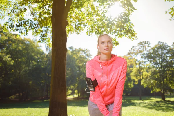 Determined Woman in a Warm Up Exercise at the Park — Stok fotoğraf