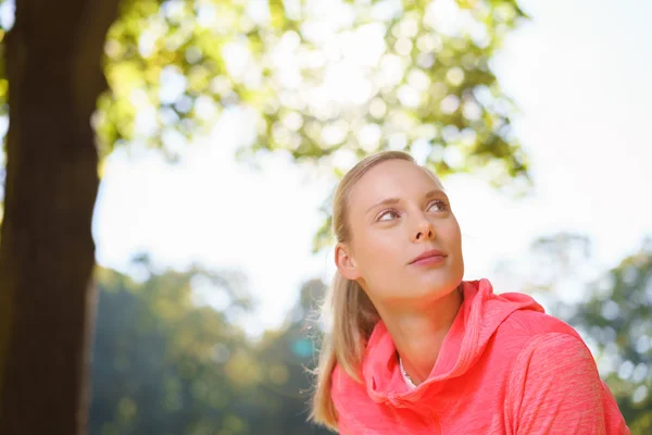 Thoughtful Woman Resting after an Outdoor Exercise — 图库照片