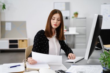 businesswoman checking documents clipart