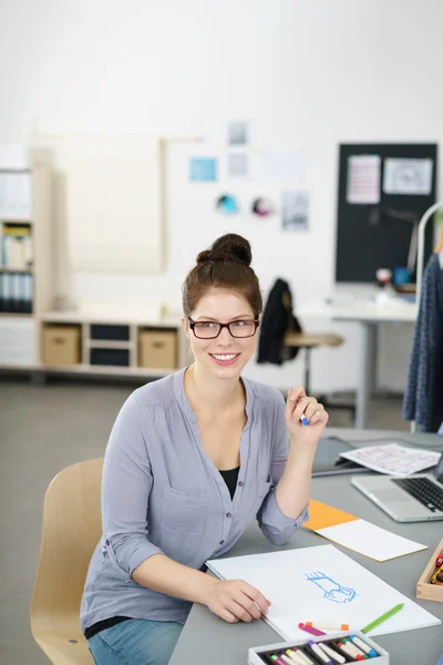 Cartoonist with Drawing Materials at her Table — Stock Photo, Image