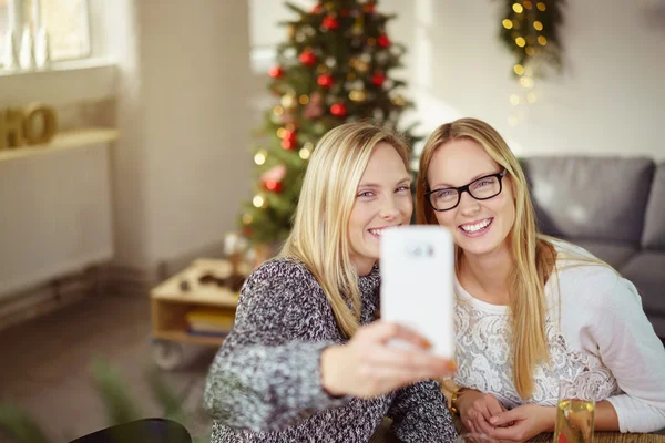 Christmas selfie with mobile phone — Stock Photo, Image