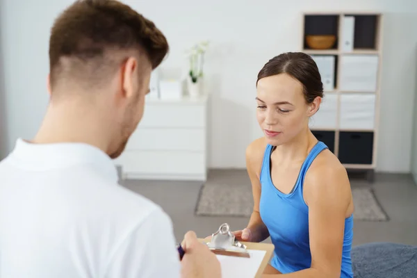 Orthopedist Interviewing the Female Patient — Stock Photo, Image