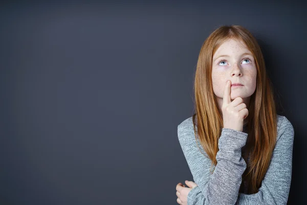 Thoughtful pretty little redhead girl — Stock Photo, Image