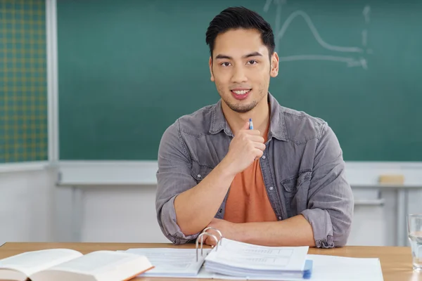 Smiling confident Asian university student — Zdjęcie stockowe