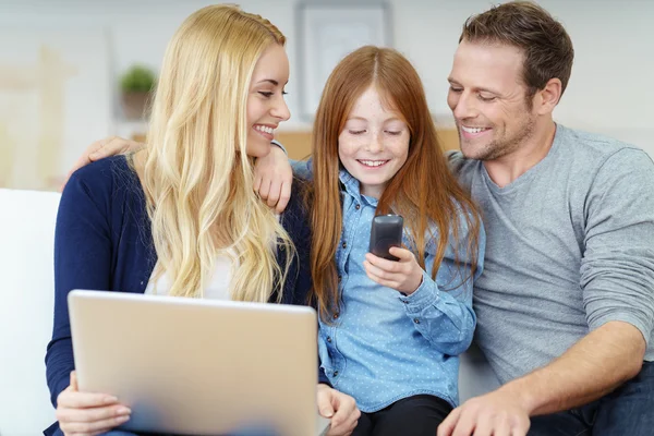 Young girl checking her mobile for messages — Stock Photo, Image