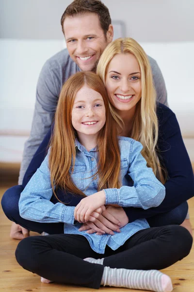 Attractive positive happy young family — Stockfoto