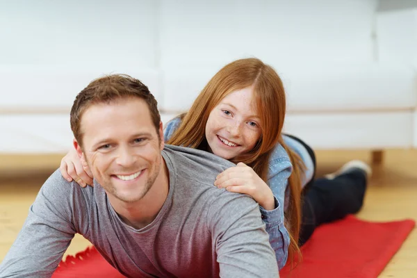 Playful little girl with her handsome father — 스톡 사진