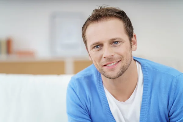 Smiling young man with stubble on face — Stock Photo, Image