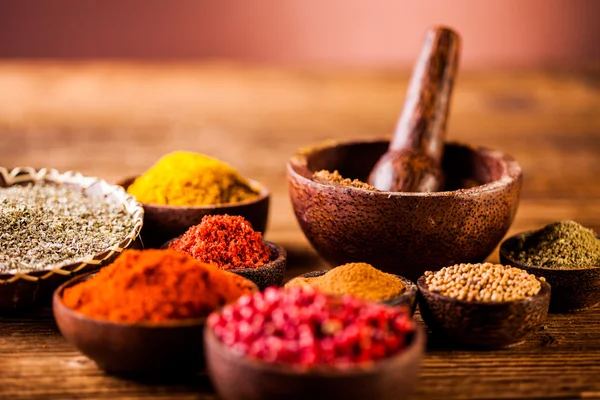 Spices in Indonesian wooden bowls — Stock Photo, Image