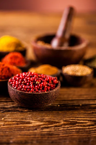 Spices in Indonesian wooden bowls — Stock Photo, Image