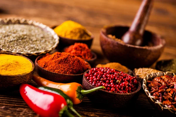 Indonesian seasoning with oriental wooden bowls