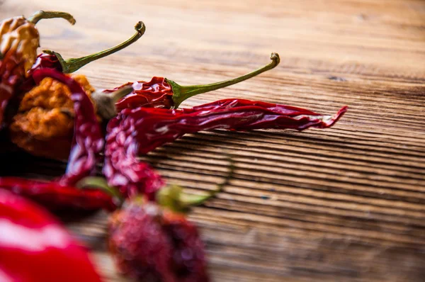 Hot spices in bowls, oriental theme — Stock Photo, Image