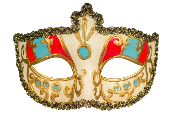 Карнавальная маска, покрашенная в золотой цвет, украшает синие и красные вставки — стоковое фото