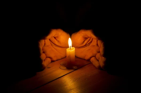 Candle, hands, flame, wood. — Stock Photo, Image