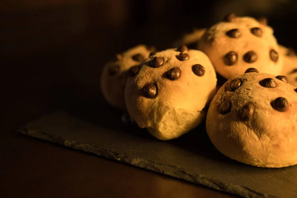 Delicious Dinner Rolls Dark Chocolate Chips Square Slate Plate — Stock Photo, Image