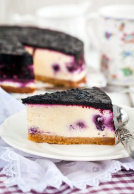Delicious blueberry cheesecake  clipart