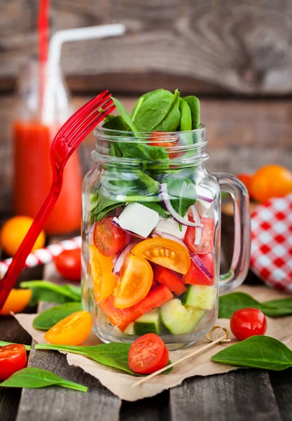 Fresh healthy vegetable salad in glass jar — Stock Photo, Image