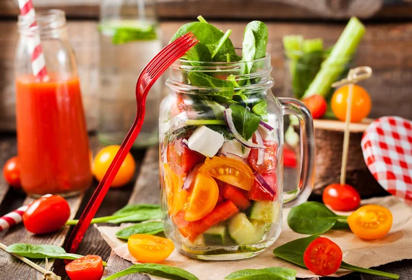 Fresh healthy vegetable salad in glass jar — Stock Photo, Image