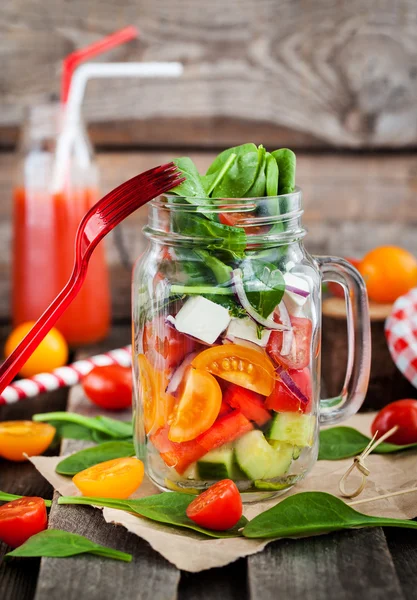 Fresh healthy vegetable salad in glass jar — Stock Photo, Image